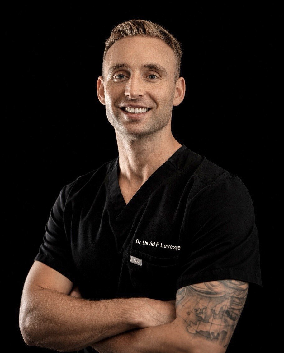 Dr David Perrault-Lévesque, professional portrait in clinical uniform